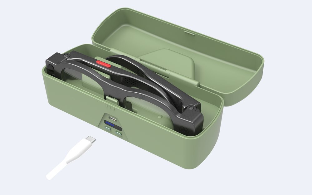 The Mavis Smart Case, a green clamshell case with the glasses resting inside on charging contacts.